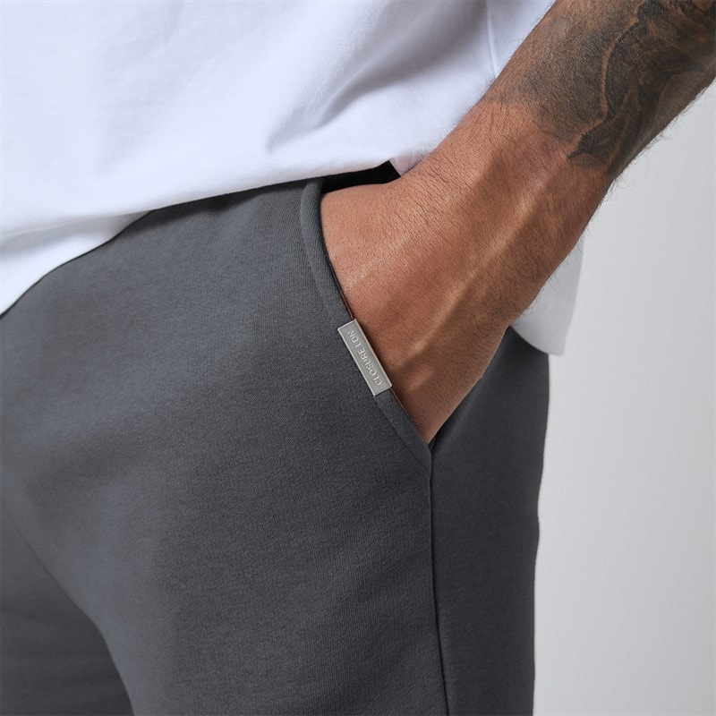 Herren - Entspannte Jogginghose mit Offenem Saum Charcoal - Bild 4