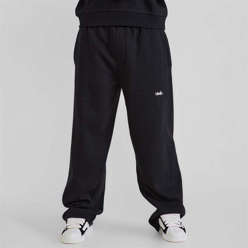 SikSilk Mężczyźni spodnie dresowe essentials o szerokich nogawkach - Czarny